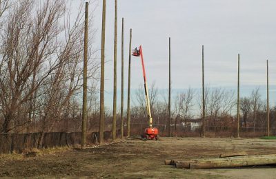 Wood support pole installation