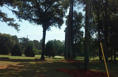 50' Wood Poles supporting Driving Range Netting