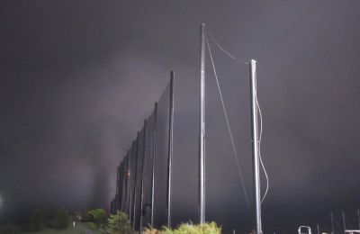 Fog rolling in at the end of the day installing Golf Netting Panels