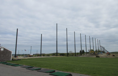 Starting to install the golf netting for the driving range