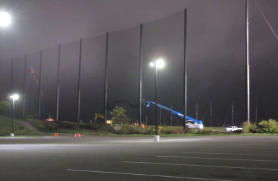 Fog rolled in at the end of the day installing golf netting panels